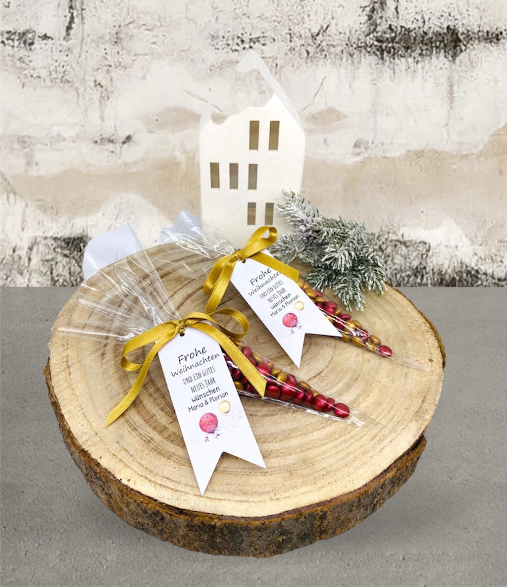 Glædelig jul og søde hilsner fyldt med chokoladeknapper